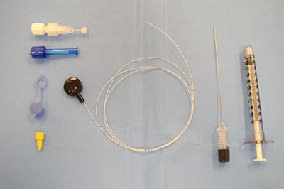 Fig 1 This is an example of a spinal microcatheter. This model employs a catheter (28 gauge) through needle (22 gauge) technique. A 1 ml syringe is required to generate enough fluid pressure to inject through the tiny catheter